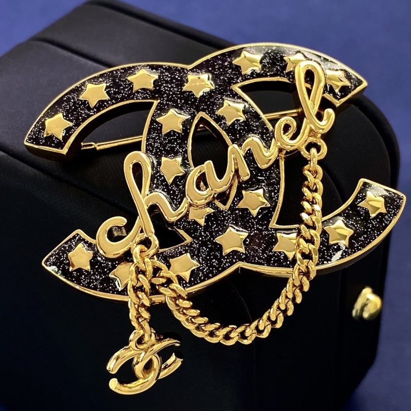 Ch*el brooches